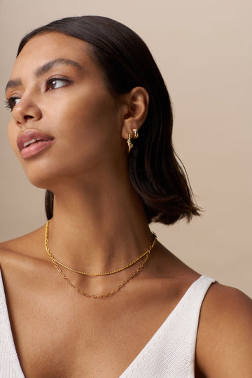 Polished Twist Huggie Hoop - Gold