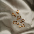 Crystal Star Charm Huggie Hoops - Pale Gold