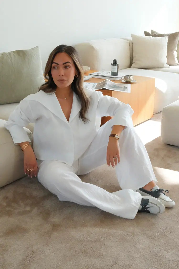 Comfortable linen pants are a practical choice for the standing-room, high-energy environment typical of banana ball events in warm climates like Midland, TX.